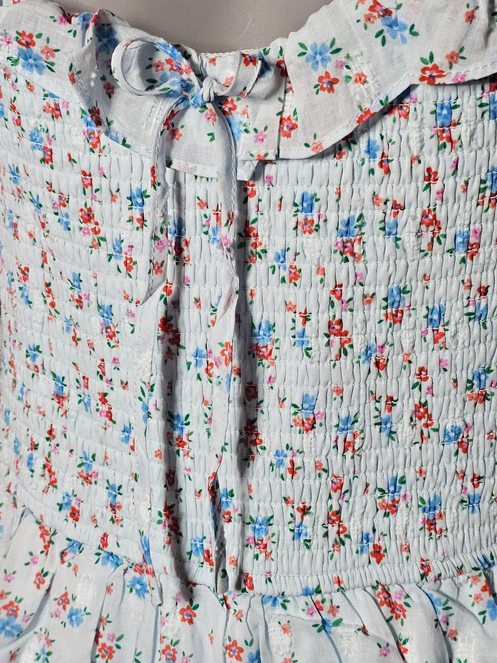 Altar'd State Baby Blue Ditsy Floral Smocked Lace Ruffle Romper - The Garment Garden Boutique