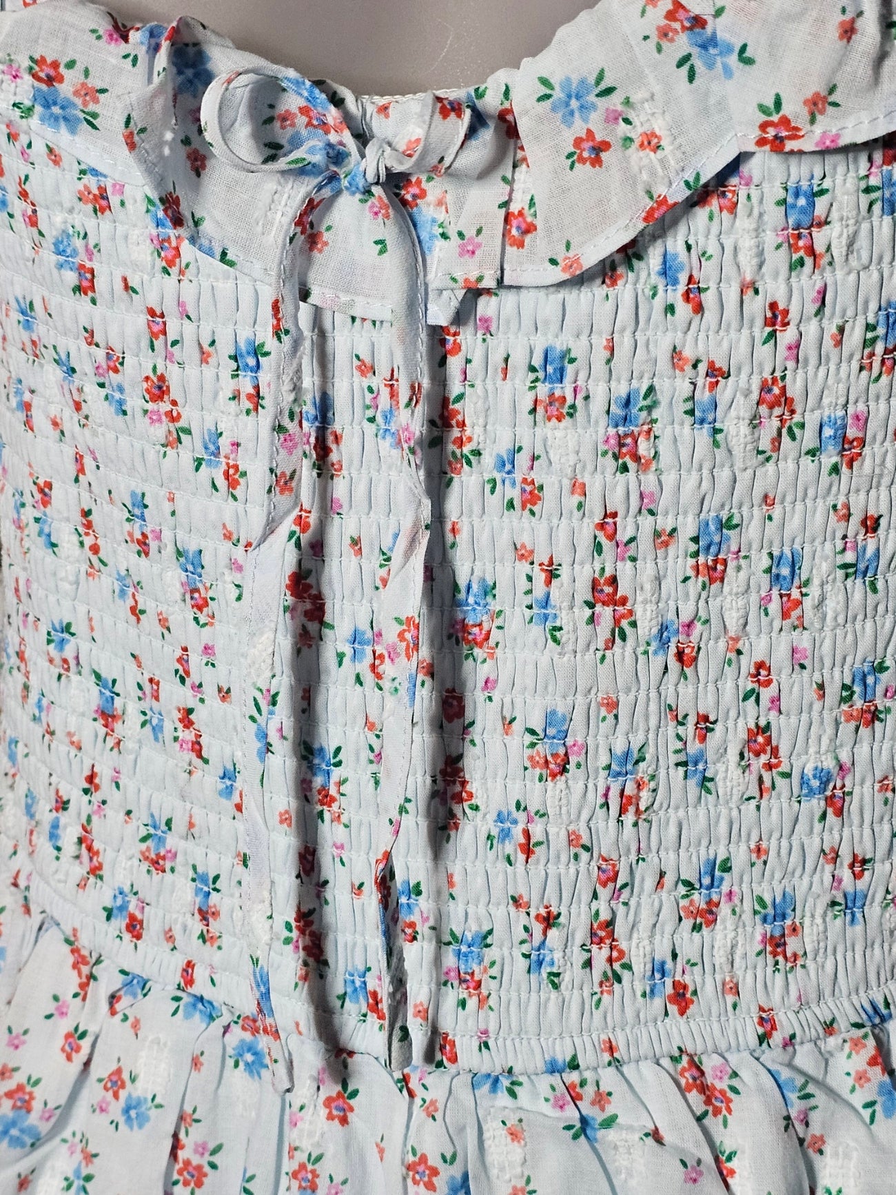 Altar'd State Baby Blue Ditsy Floral Smocked Lace Ruffle Romper - The Garment Garden Boutique